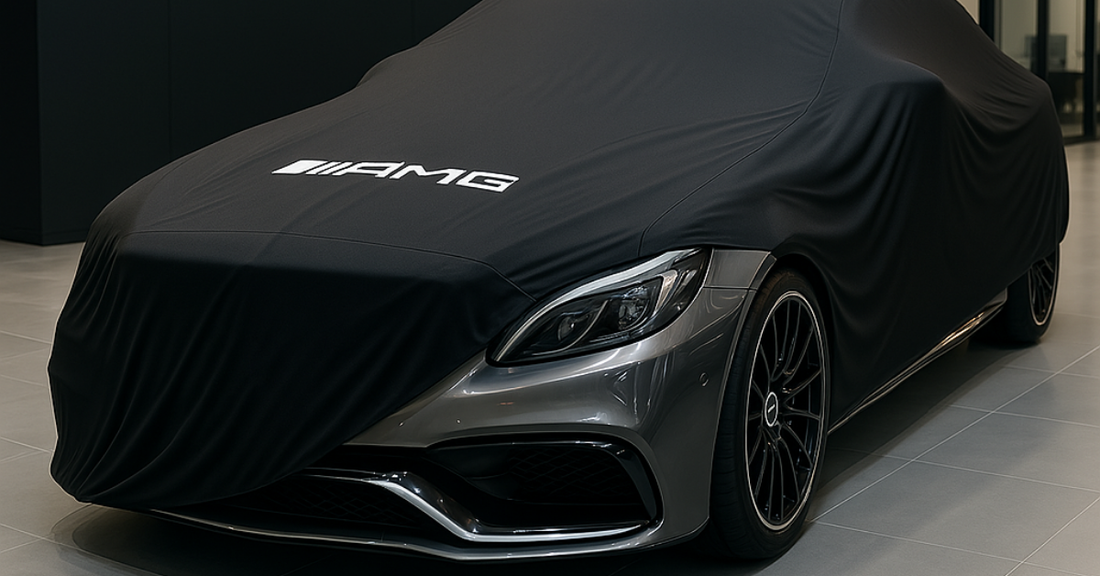 Mercedes AMG covered with a custom indoor car cover in a luxury garage