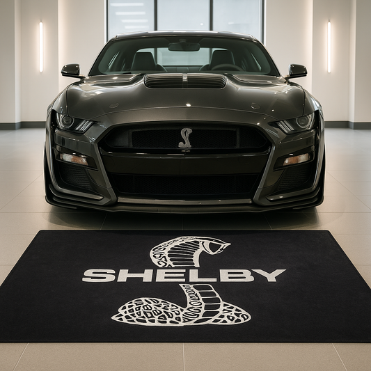 Large Mustang Shelby Cobra logo floor rug, 5x7 feet, with non-slip backing, featuring the iconic cobra snake emblem in a professional garage.